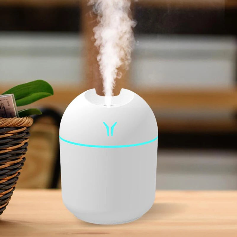 Mini humidificador de aire USB de 250 ml con difusor de aceites esenciales para el hogar y el coche, difusor ultrasónico silencioso con luz LED de colores.
